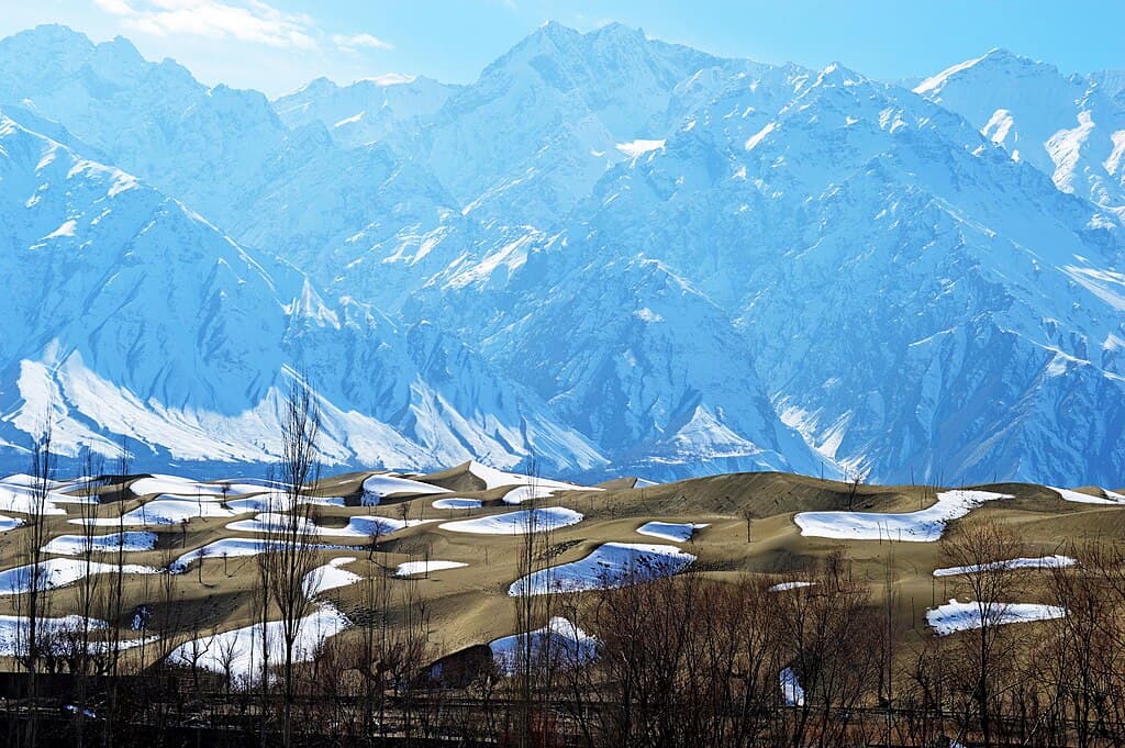 Sarfaranga cold desert near Shigar with snow on the dunes